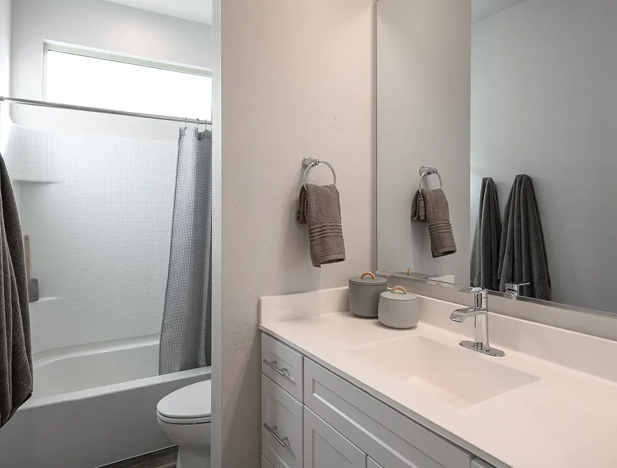 Apartment bathroom — representative home at Village at Camelback Park.