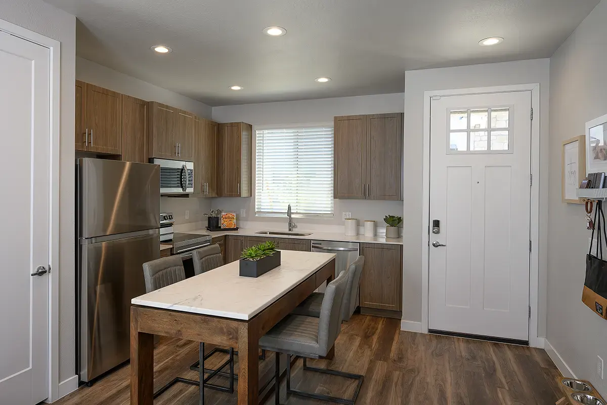 Apartment kitchen — representative home at Village at Camelback Park.