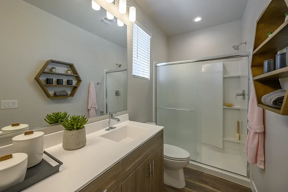 Apartment bathroom — representative home at Village at Camelback Park.